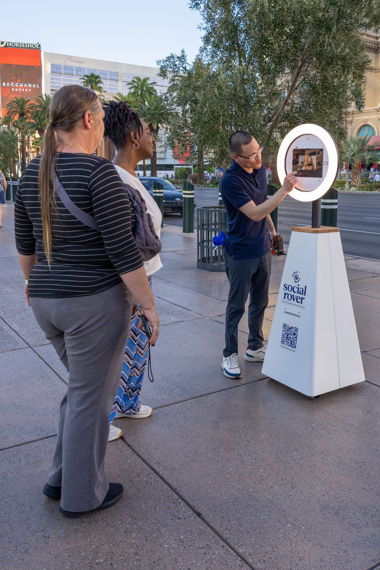 An attendant setting up The Social Rover for guests on the Strip
